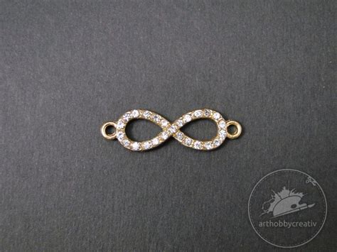 Ce spun unele legende despre mărţişor? Charm pentru martisor - simbol infinit cu pietrice - Charmuri - Arthobbycreativ