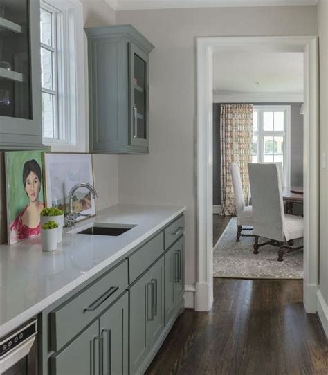 Here are our favorite grayish green colors. Soft gray green painted cabinets add some interest to the butler's pantry, a pass through space ...