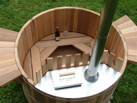 Tiny go go blog shared a look at a few different wood fired soaking hot tubs including one his this is an up close look at the project in action. Wood Fired Japanese Soaking Tub - Bathtub Designs