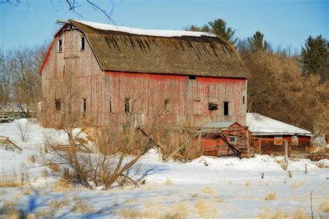 Old Red Barn On A Winter Afternoon By Laurie With Old Red Barn On A