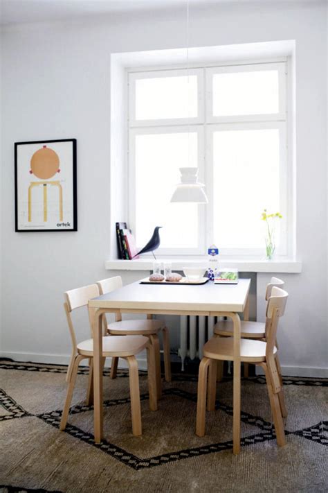 Get a rustic cabinet and put some decorations on it, such as an antique glass vase design your room in white anddecorate the room with furniture with the same color too. Dining room with modern wooden furniture | Interior Design ...