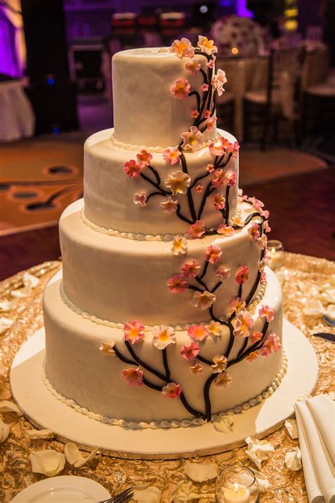Sugar flowers for wedding cakes for sale. White Tiered Wedding Cake with Sugar Flowers