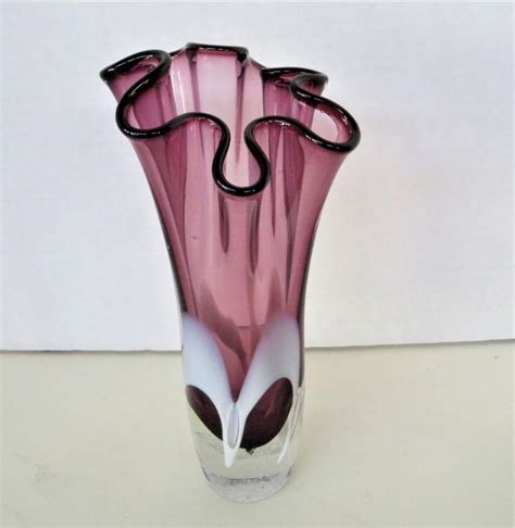 A collectable piece that is also a decorative alarm clock. 24% Lead Crystal Cranberry Fluted Glass Vase Poland 8.5 ...