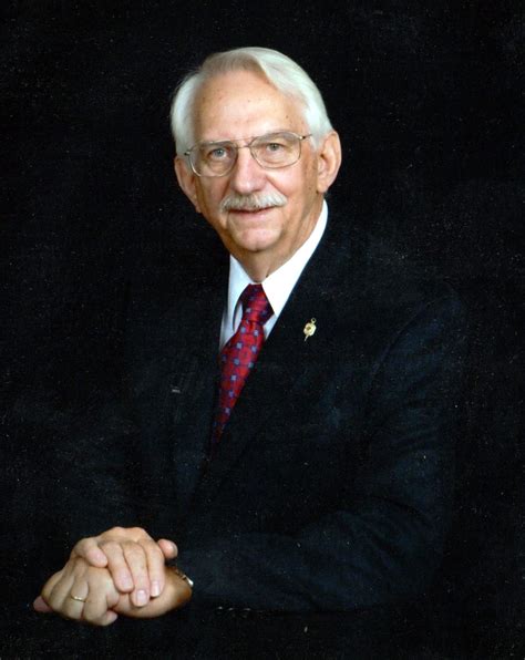 Does the image show a picture of a mountain and a river? Mitchell Hooper Obituary - Lynchburg, VA