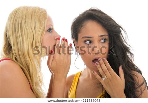 Two Girls Talking Secrets Each Other Stock Photo 211389043 Shutterstock