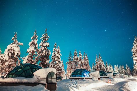 The kakslauttanen arctic resort in finland provides accommodation inside glass igloos for guests to view the northern lights. See the Northern Lights from a glass igloo in the middle ...