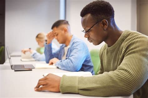 Black Man Students And Studying For Education Knowledge And Focus For