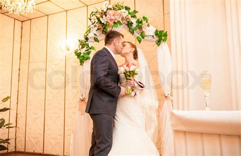 Just Married Couple Kissing In Luxurious Interior Stock Image Colourbox