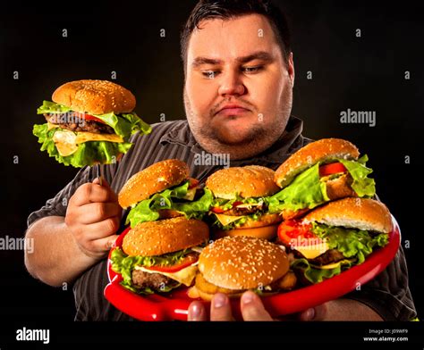 Fat Man Eating Fast Food Hamberger Breakfast For Overweight Person