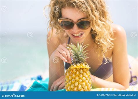 Woman Lying At Beach While Having Pineapple Stock Image Image Of Amusing Entertaining