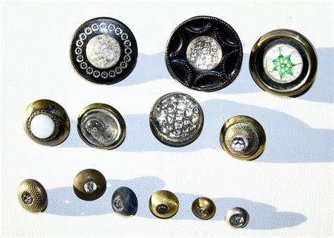 Lot Of Thirteen Buttons Glass Mounted In Metal Variation In Size