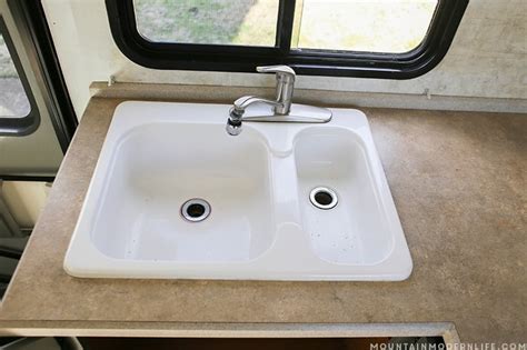Farmhouse sinks have been in use for centuries, typically in areas where a large amount of potable water is stored. How to Remove Your RV Kitchen Sink | MountainModernLife.com