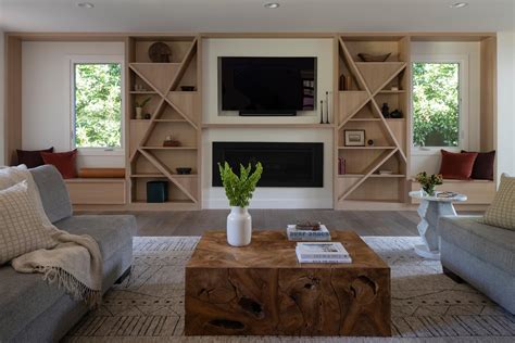 Creative Shelving Shapes Were Designed For This Living Room Wall That