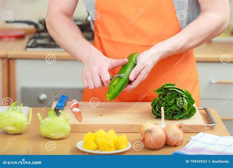 Man Preparing Vegetables Salad Peeling Cucumber Stock Photo Image Of