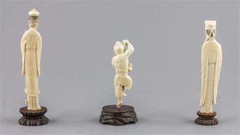 Lot A Pair Of Late 19th Century Chinese Ivory Carvings Of An Official
