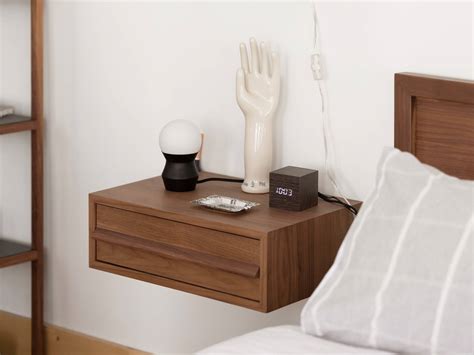 A nightstand, (could also be called a night table or bedside table) is a small type of table. EQ3 Marcel Single Drawer Floating Nightstand | Low Nightstand