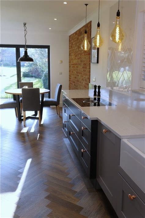 We get it, a kitchen rug might not seem like an intuitive choice. Shaker style kitchen in two tones of grey | Shaker style ...