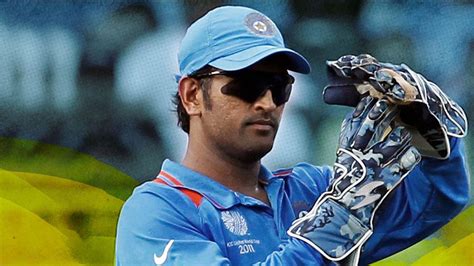 Ms Dhoni With Gloves Is Wearing Blue Sports Dress And Cap Hd Dhoni