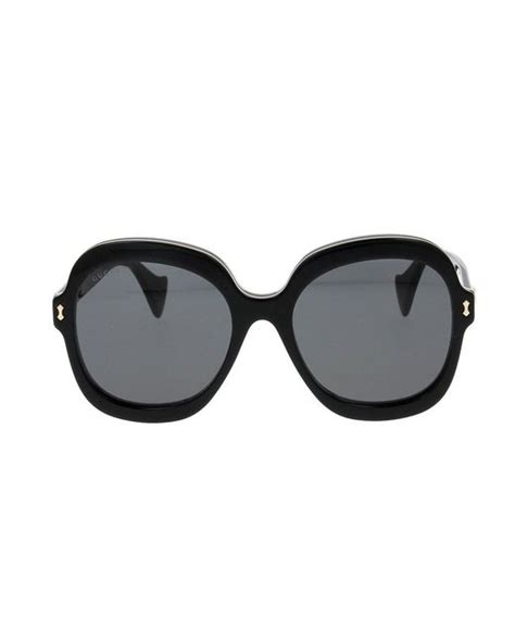 gucci oval frame sunglasses in black lyst