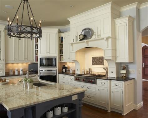 If you don't choose the right ones, your home will never get the french country style you're dreaming of. oven area | Antique white kitchen cabinets, Antique white ...
