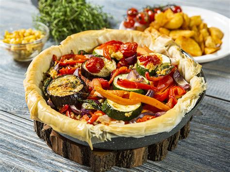 It reminds me of a fruit peach and berry puff pastry dessert. Roasted Vegetable Tart with Phyllo Dough