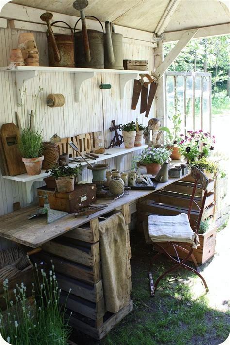 Inside the garden shed on the property behind the farmhouse, a utilitarian space has been transformed into a garden hideaway complete with sitting area, woodstove, antique display cabinets for garden trinkets, a potting bench, and a work desk for recording the seasonal changes. Dreamy working area ! | Classic garden, Garden room ...