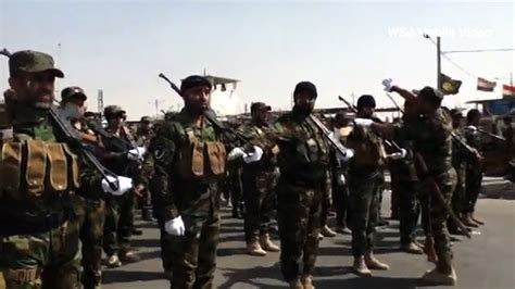 Iraqs Mahdi Army Forces Hold Rally In Sadr City Youtube