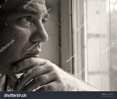 Sad Man Looking Out The Window Stock Photo 56845804 Shutterstock