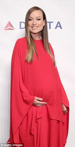 Pregnant Olivia Wilde Shows Off Her Growing Bump In Elegant Red Dress Daily Mail Online