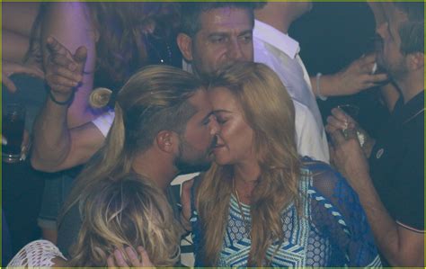 Lindsay Lohan Kisses Business Partner Dennis Papageorgiou Photo