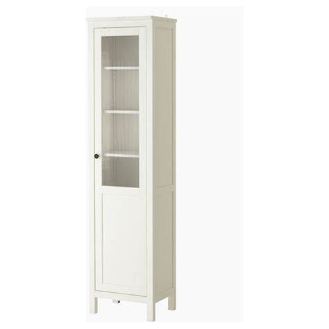 A Tall White Cabinet With Glass Doors On The Front And Bottom Shelves