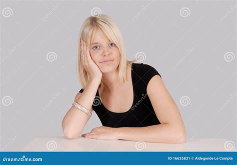 Young Blond Woman Head Resting On Her Hand Stock Image Image Of Grey