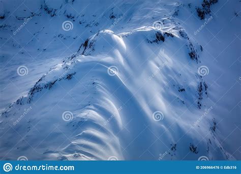 Aerial View From Above Of White Glacier Mountains Stock Photo Image