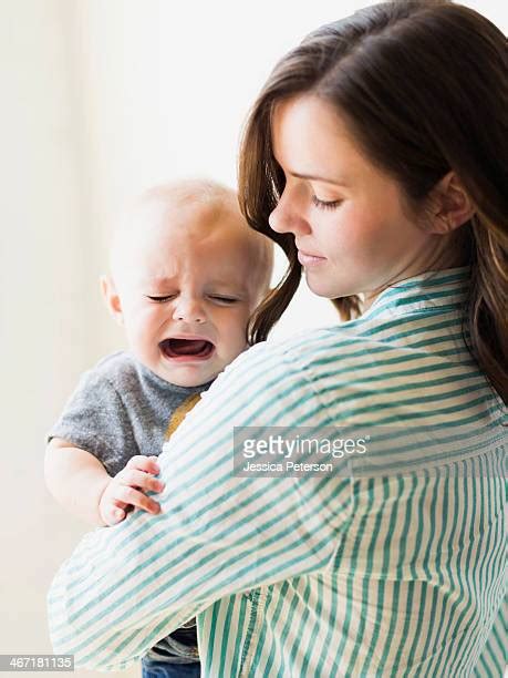 Baby Cry Comfort Photos And Premium High Res Pictures Getty Images