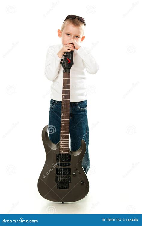 Cute Little Boy Holding A Guitar Royalty Free Stock Photography Image