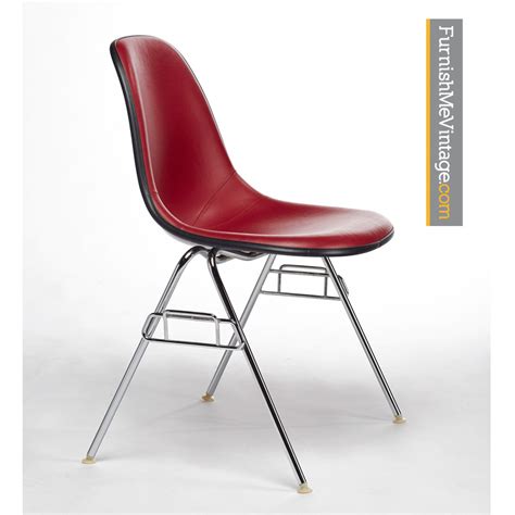 Construction the herman miller original is said to have rubber shock mounts on the back portion of the chair that allow the chair to conform slightly to you. Eames by Herman Miller Vinyl Red Fiberglass Shell Chairs
