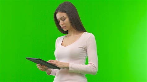 The Woman With Tablet Stand On Green Screen Stock Footage Sbv 313529608