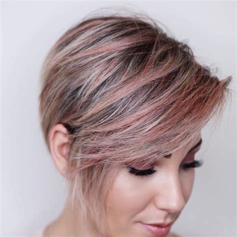 The combination of the red hues and dark roots adds contrast, while the wavy style of the hair accents the orange tones. 10 Best Bob Hairstyles for 2020 - Cute Short Bob Haircuts