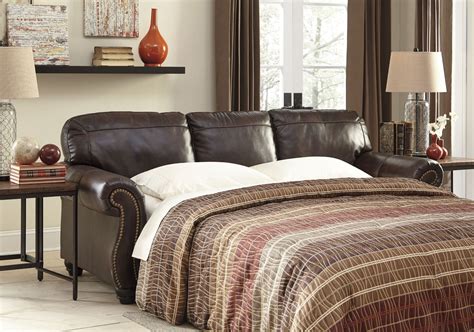 Accommodate extra guests with ease with the pearson queen sleeper sofa from american leather. Bristan Walnut Queen Sofa Sleeper from Ashley (8220239 ...
