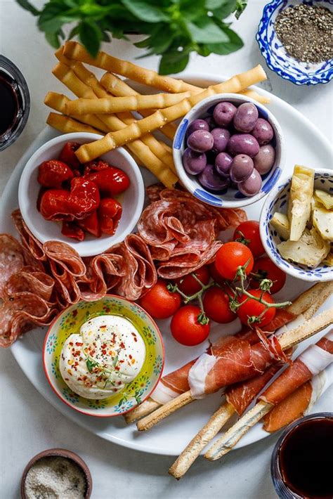 It's the time to get a nibble of olives and pickled peppers or a bite of cured meats and cheeses, and to prepare your belly for the feast about to. How to host an Italian feast | Recipe | Antipasto recipes ...