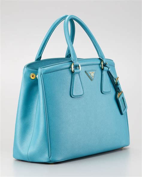 A large goal, typically one of three categories: Prada Parabole Saffiano Luxe Tote Bag in Blue - Lyst
