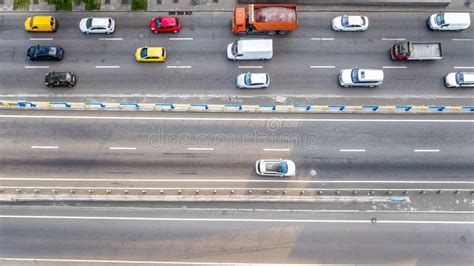 Aerial Top View Of Road Automobile Traffic Of Many Cars On Highway From