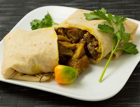 Jamaican Curry Goat Roti Curry Goat Roti Our House Made Curried Goat Bone In Wrapped In A Warm