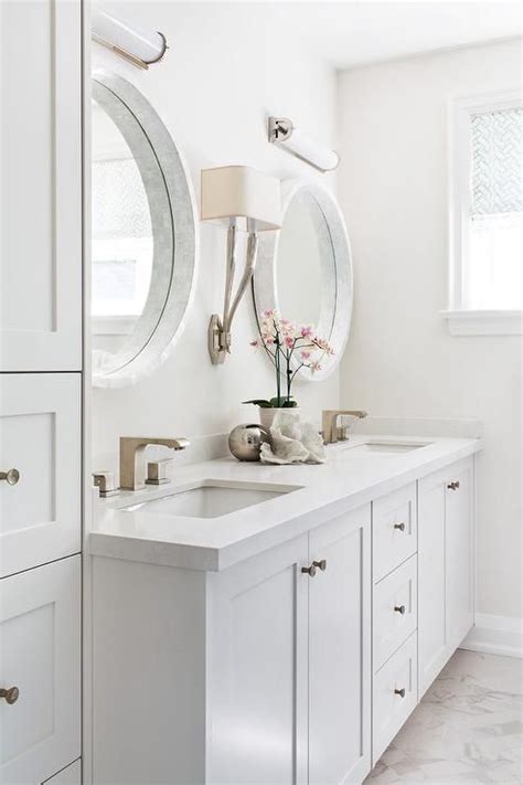 A wide variety of round dual vanity mirror options are available to you, such as features, finishing, and sides. Beautiful light gray bathroom is fitted with white glass ...