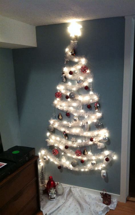 However, there are ways to hang your decorations without making any marks on the wall. The No Tree Christmas Tree | Wall christmas tree, Diy christmas tree, Christmas tree decoration ...