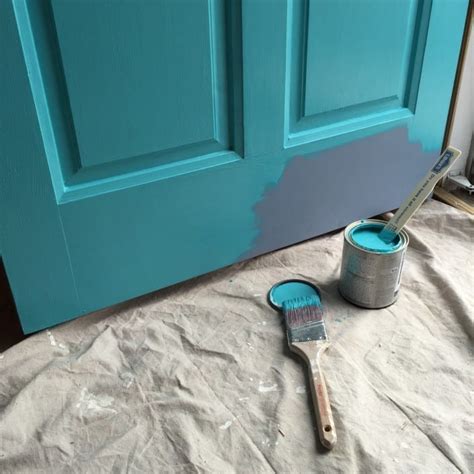 £90 with free local delivery. Gray House No Shutters Turquoise Door - white house black shutters
