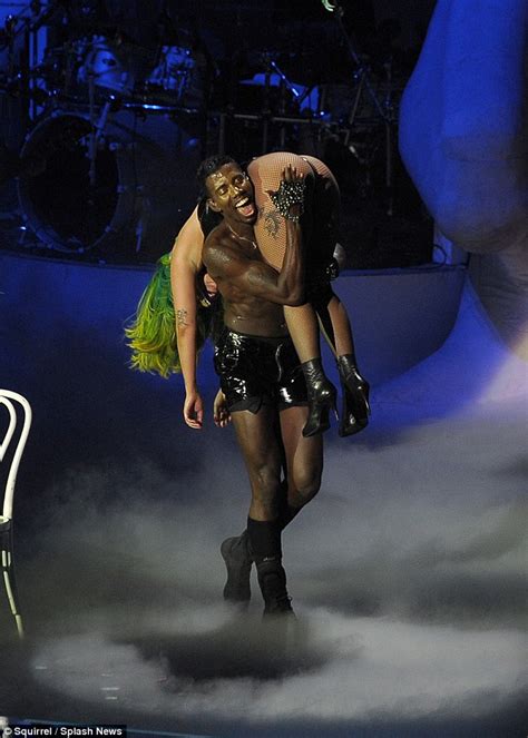 Lady Gaga Writhes Around Onstage With Shirtless Man During Amsterdam