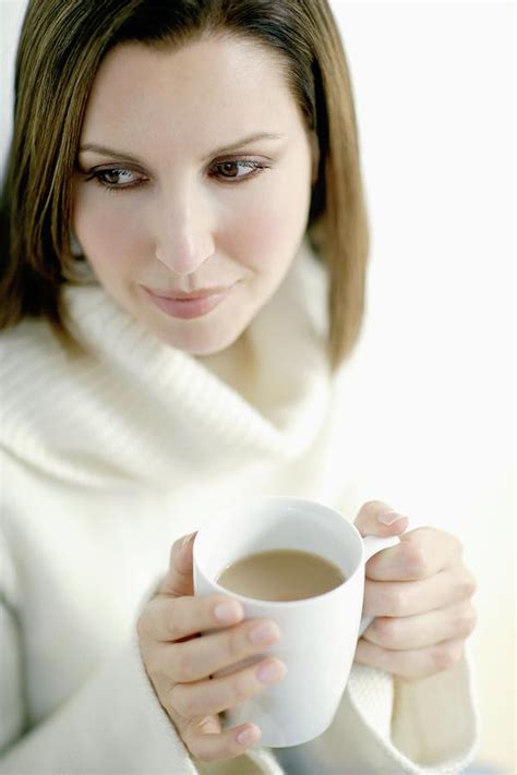 Woman Drinking Tea Photograph By Ian Hooton Science Photo Library Pixels