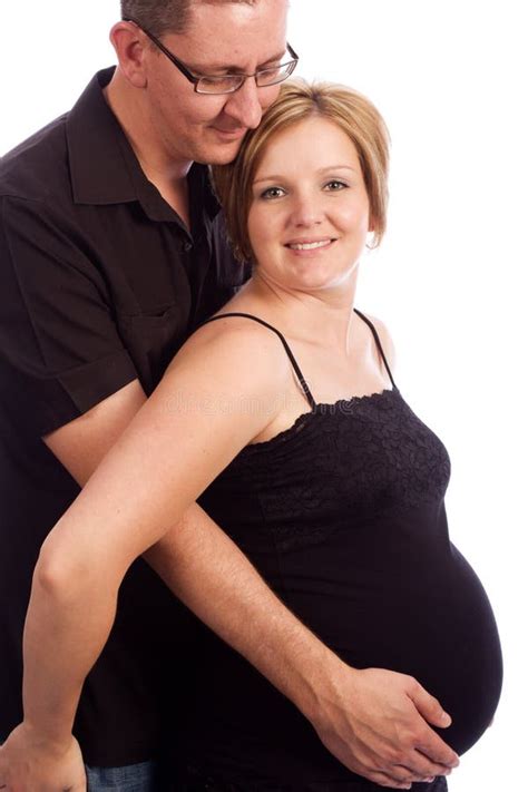 Husband Kissing Pregnant Belly Of His Wife Stock Photo Mangostock My