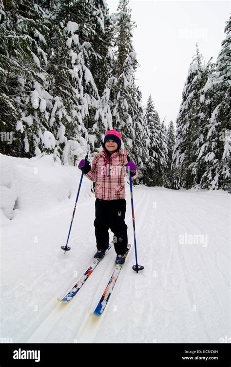 Young Girl 7 Enjoys A Day Cross Country Skiing At Larch Hills Nordic